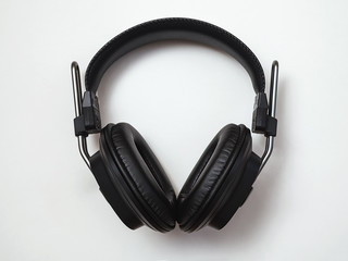 isodynamic full-size closed headphones, ear pads on a white background