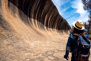 Lady backpack travel in Wave rock
