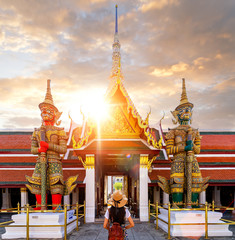 Asian lady walking and travel in Wat Phra Kaew