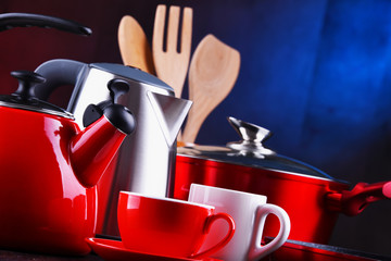 Composition with kitchen vessels, kettles and cups