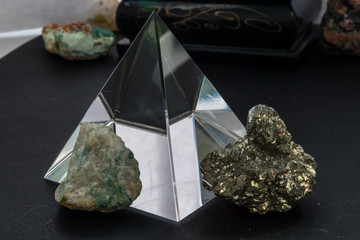 Pyramid of rock crystal and the mineral pyrite and green quartz