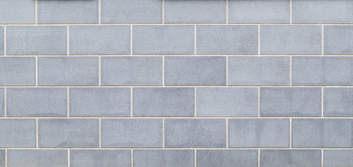 High resolution full frame background of a new, modern and clean wall or building exterior made of...