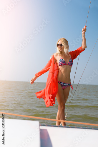 Fotobehang Young Beautiful Slim Sexy Girl In Bikini And Pareo Is Resting On Cruise On A Private Sailing Yacht Katafree Fotobehang Young Beautiful Slim Sexy Girl In Bikini And Pareo Is Resting On Cruise On A Private Sailing Yacht Katafree