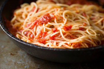rustic italian spaghetti pasta in tomato sauce