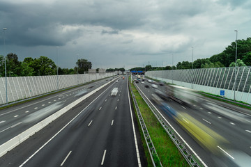 Traffic over the highway, motion blurred traffic, ring east A10, 06/14/2019 Amsterdam the Netherlands, speedway, freeway fast