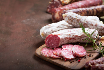 Various kind types of salami, speck and sausages