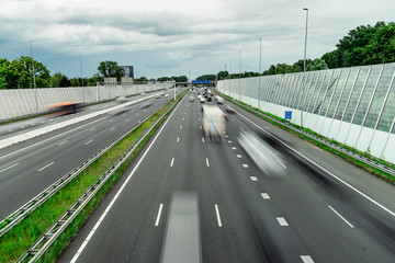 Traffic over the highway, motion blurred traffic, ring east A10, 06/14/2019 Amsterdam the Netherlands, speedway, freeway fast