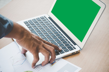 Manager push enter button on laptop to input the data; chrom key green screen display