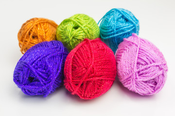 assortment of balls of wool in bright colors