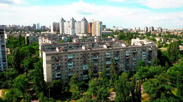 4K, Drone, Slow moving shot, the water canal and apartment buildings at Rusanovka Island, Ukraine.