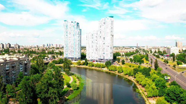 4K, Drone, Slow moving shot, the water canal and apartment buildings at Rusanovka Island, Ukraine.
