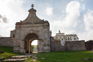 Fototapeta na wymiar Gate of the Holy Cross Monastery, Lysa Gora, Swietokrzyskie Mountains