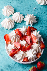 Vanilla meringues with strawberry. Summer dessert