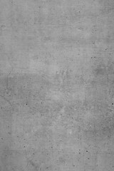 Graue Betonwand, Grauer Hintergrund, Rustikale Textur im Hochformat