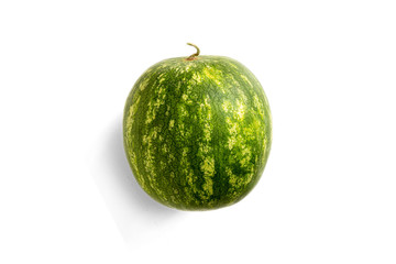 Watermelon isolated on a white background. Natural light and shadows