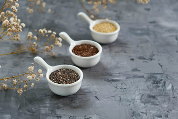 Fototapeta na wymiar Chia seeds, flax seeds, quinoa groats. Healthy food, diet, detox.