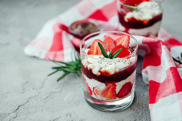 Sweet strawberry chia pudding dessert with cream and jelly