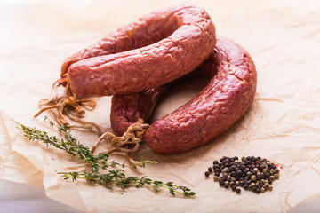 Food, national cuisine and delicious concept - Traditional Central Asian horse meat sausage