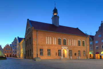 Night photo of the Old Market Square in Olsztyn. In the foreground library building. Warmia, Poland.