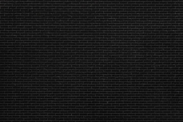 Background of black, flat bricks texture.