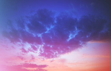 Naklejka na ściany i meble Dramatic pale clouds during sunset landscape background