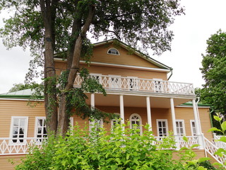 Typical old house of 19th century — historical and architectural monument in estate of Russian poet Lermontov. Travel to Russia. Selective focus.