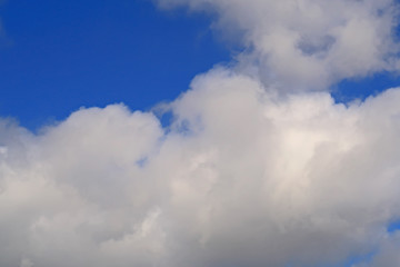 A large cloud in a blue sky
