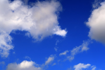 Cloud filled deep blue sky