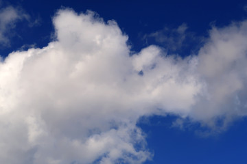 Large clouds in a deep blue sky