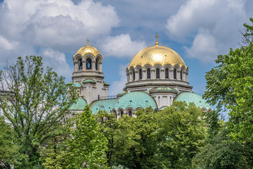 Fototapeta na wymiar Golden domes of St. Alexander Nevsky Cathedral, 1882-1912, neo-byzantine style, Bulgarian Orthodox, Sofia, Bulgaria.
