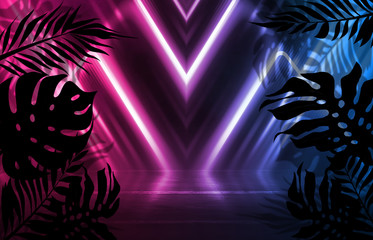 Background of empty dark scenes with neon lights and shapes, smoke. Silhouettes of tropical palm leaves in the foreground. Bright futuristic abstract background