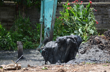 excavator dick mud in sunny day