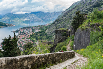 Fototapeta premium Aerial view of Dobrota and Kotor from hike to Fortress