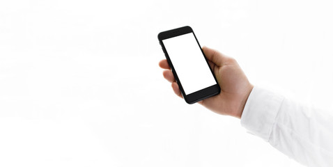 Man holding smart phone with green screen.