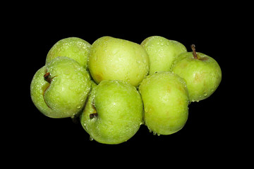 Fototapeta na wymiar green apples on black isolated background
