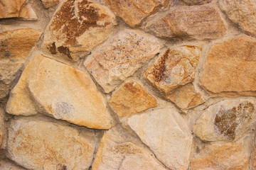  Decorative stonework light brown. Good background for photo wallpapers.