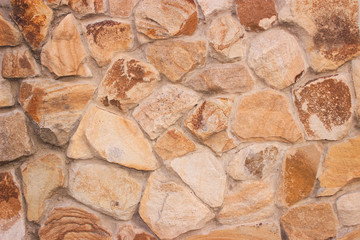  Decorative stonework, muted brown. Good background for photo wallpapers.
