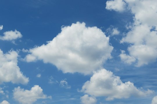 Beautiful fluffy clouds in blue sky,, natural background