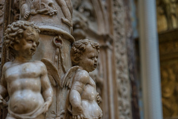 Avila, Spain - April 17, 2019. Interior of the Cathedral of Avila during the celebration of Holy Week in Spain. Biblical scenes in relief