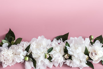 Fototapeta premium Design concept - top view of bunch of beautiful flowers on colored background with copy space