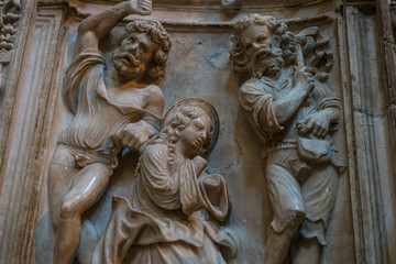 Fototapeta na wymiar Avila, Spain - April 17, 2019. Interior of the Cathedral of Avila during the celebration of Holy Week in Spain. Biblical scenes in relief