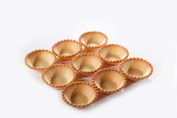 Shortbread dough form. Shape for the design of a sandwich, salad, appetizers. Photo on a white background, top view.