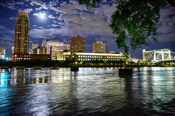 Fototapeta premium urban skyline along the river at night