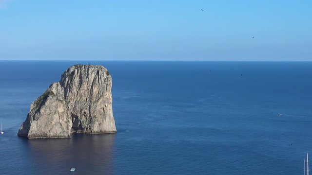 Italy, Capri, view of the Faraglioni bay, pan