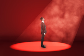 Businessman in spot light