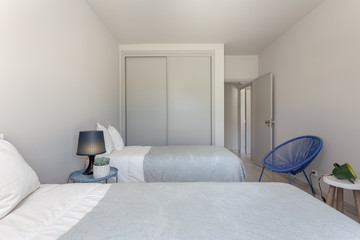 Modern bedroom in a European home with decorations.