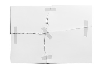 Torn sheet of paper glued with adhesive tape, isolated on white background