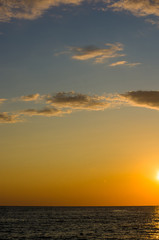 Amazing sea sunset, the sun, waves, clouds