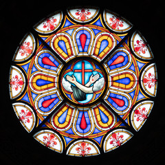A beautiful stained glass window adorns the Santa Croce Basilica in Florence, Italy.