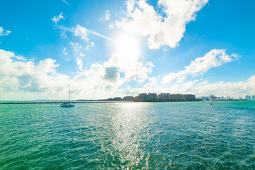 Sailing in Miami Beach bay under a shining sun
